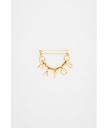 Patou brooch in gold-plated brass en stock