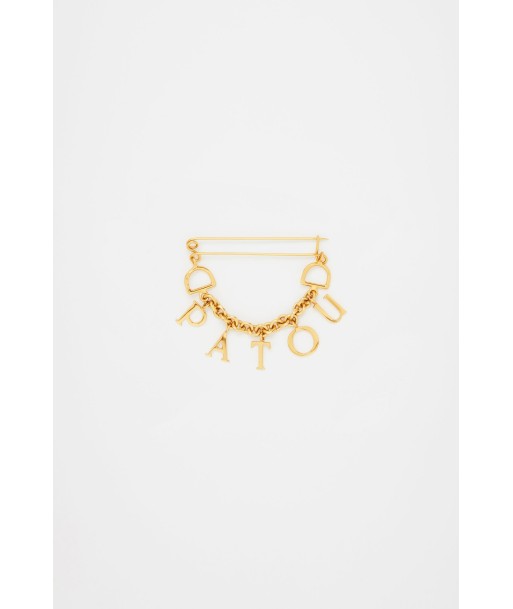 Patou brooch in gold-plated brass en stock